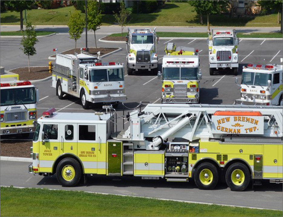 Seven New Bremen German Township fire trucks in parking lot